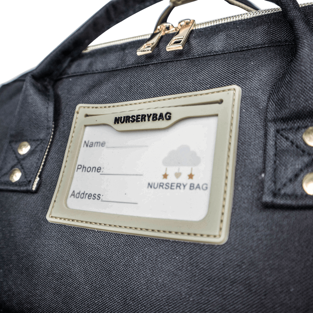 Nursery Bag - Black Convertible Diaper Bag Backpack 45 Degree Logo